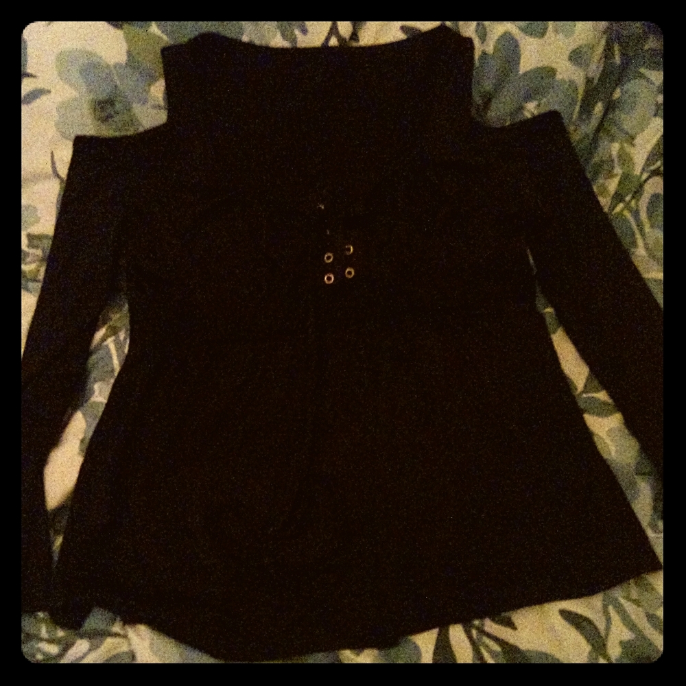 Black long sleeve open shoulder witch design top.